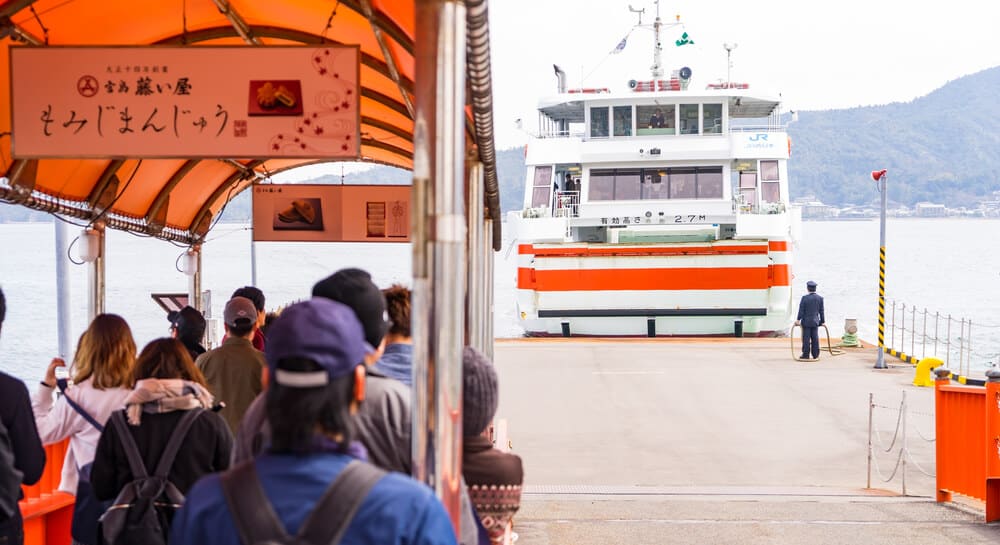 People waiting in line for the Miyajima Ferry in Hiroshima.