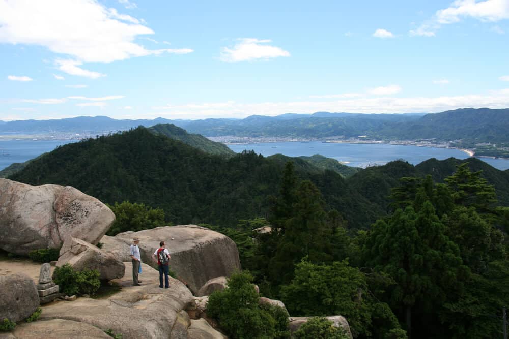 Miyajima Island Top of Mount Misen with a view of the trees and ocean.