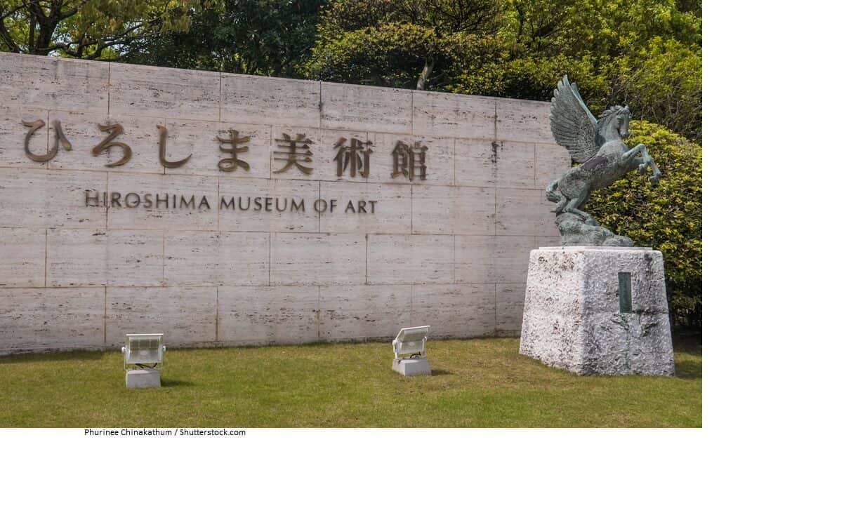 Hiroshima Prefectural Art Museum sign with a winged horse statue to the right.