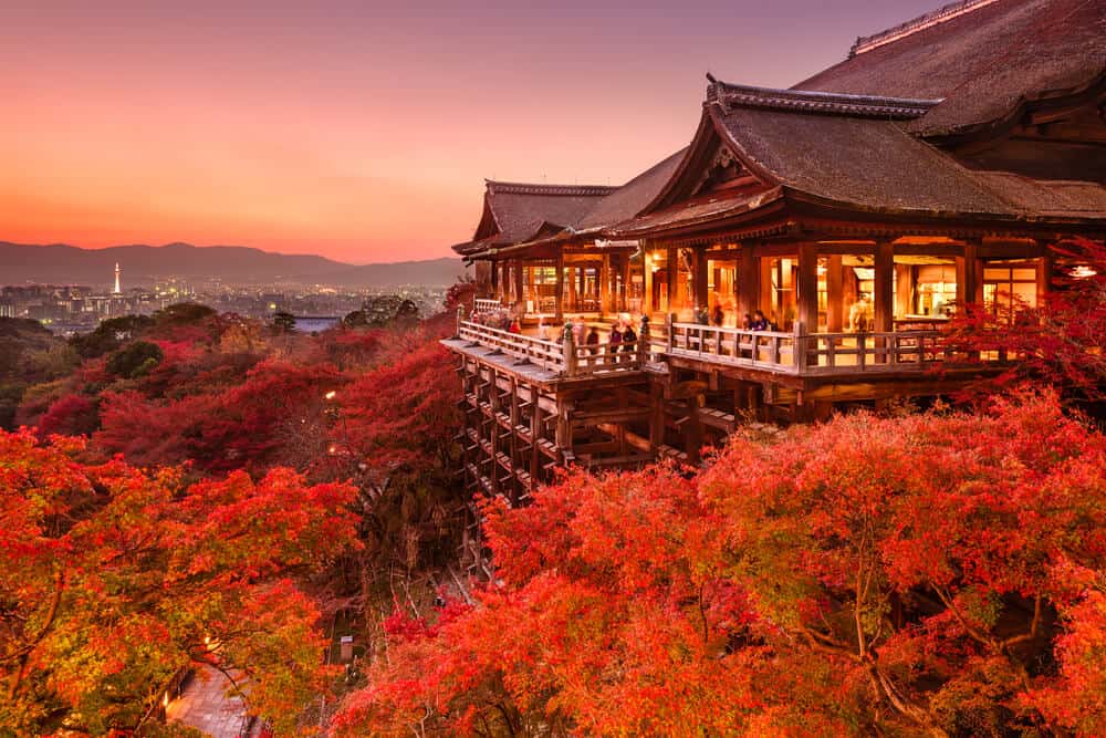 Kiyomizudera Temple at Dusk, with people on the veranda.