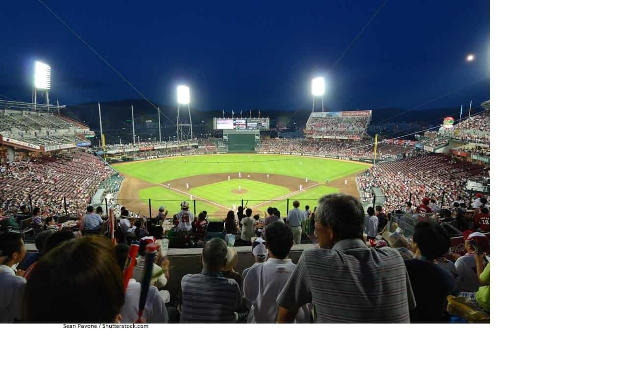 Mazda Zoom Zoom Stadium in HIroshima Japan -A Baseball Game is going on at night with a large crowd in attendance.