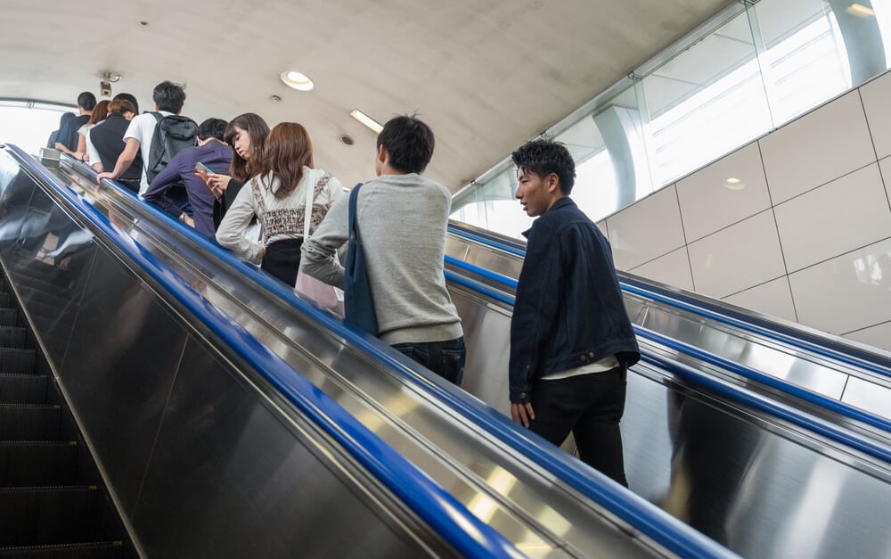 Japan Travel Guide Standing on Escalators