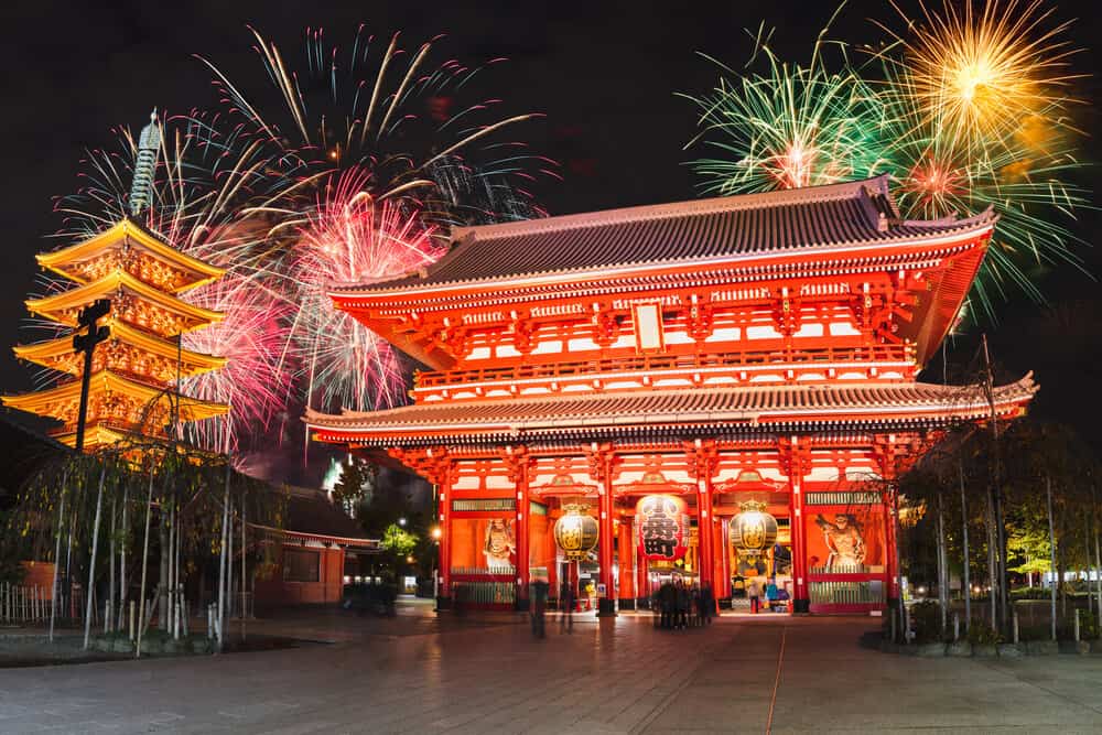 Sensoji Temple wihth fireworks in the background.