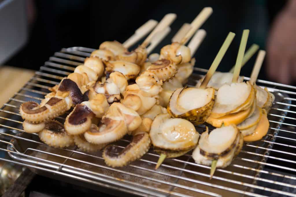 Kuromon Market Foods to Try Scallop Squid 