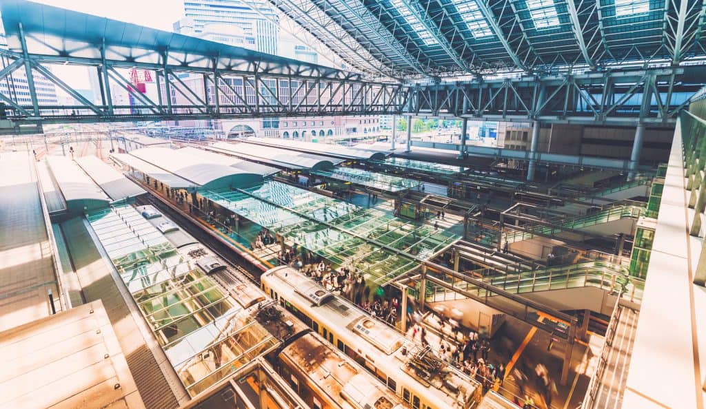 An aerial shot of the train lines and platforms of Osaka Station