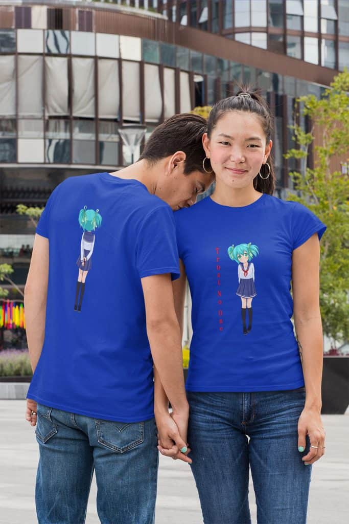 A young man and woman wearing the same blue shirt, with the woman showing the front of the shit (a cute girl anime character with the text, "Trust No One" written on it. The man, facing his back to the front, is displaying the back of the shirt (back of anime girl character).