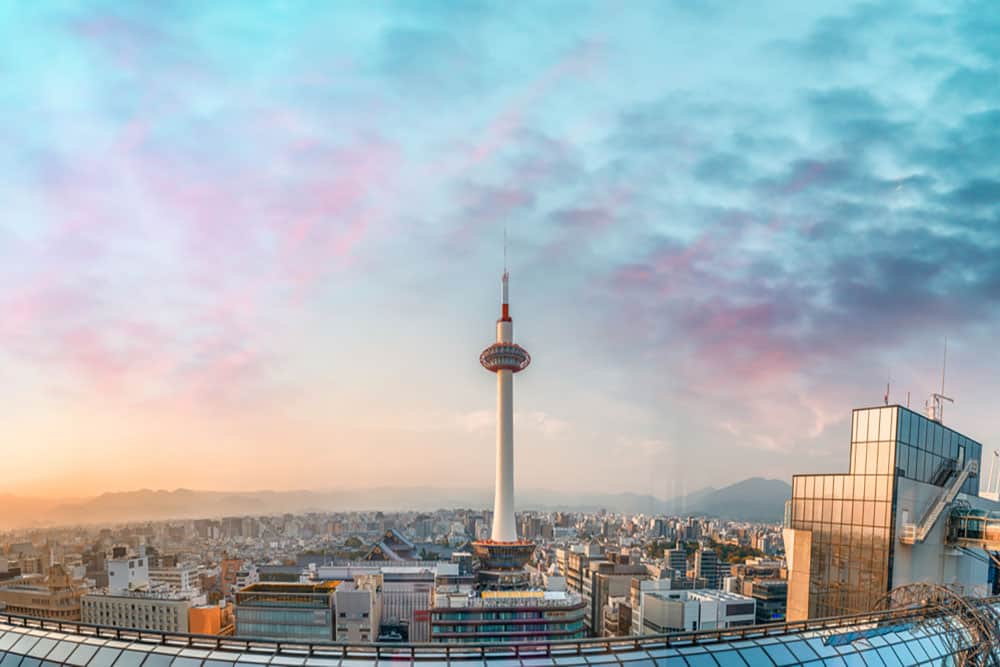 A panoramic shot of Kyoto City, filled with buildings all around.